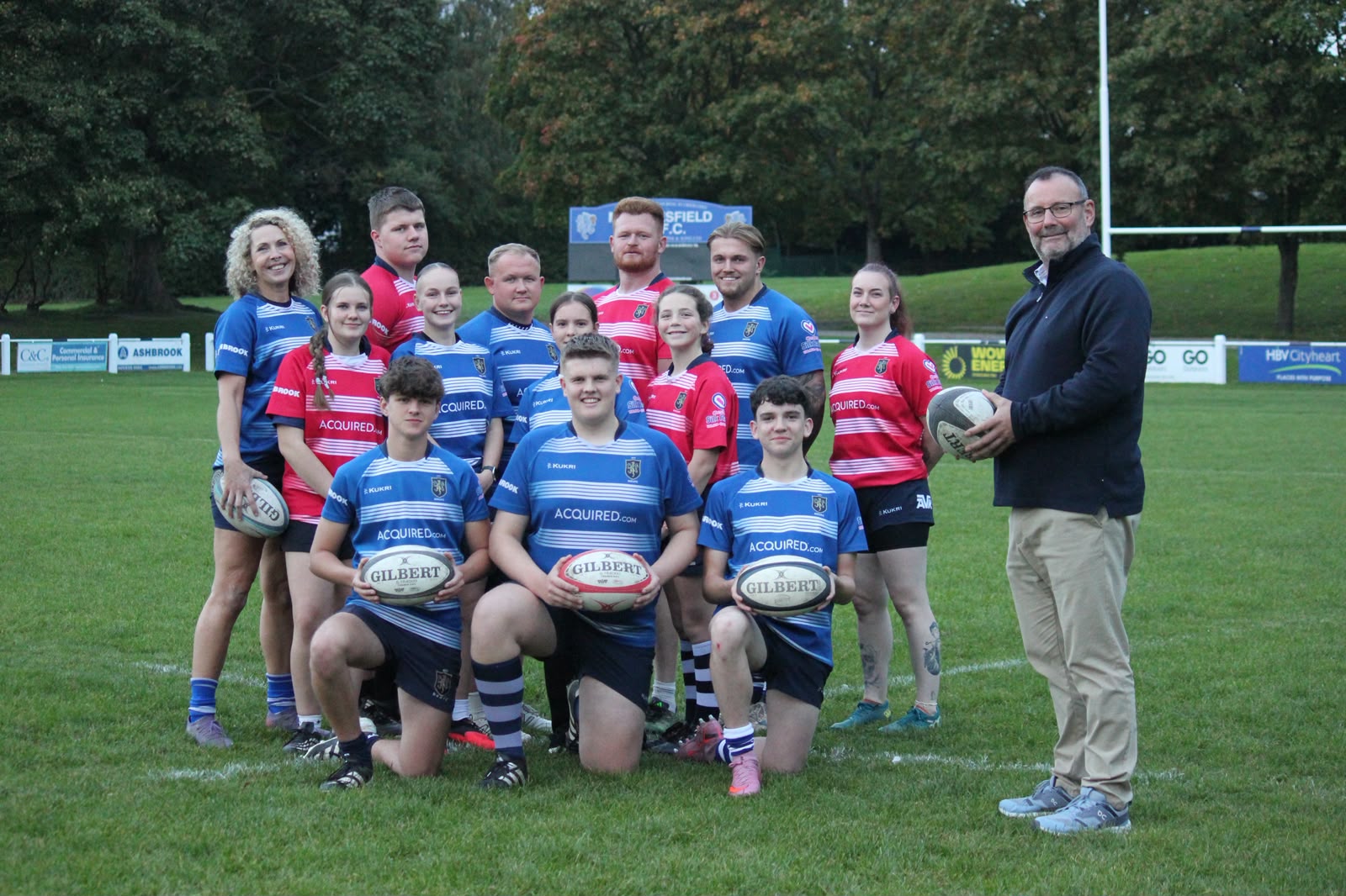 Rob Oliver, Commercial Director at Macclesfield Rugby Union Football Club, alongside girls, boys, colts, senior men and senior women who will benefit from the facilities)